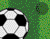 Футбольный мяч и зеленом поле
