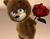 Медведь и красные розы