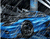 כחול ספורט רכב תחת גשם