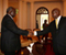 Museveni Shaking Hands With Former President Kibaki
