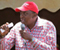 President Uhuru Kenyatta With A Red Tna Cap