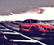 Red BMW 6 Series Speeding