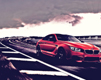 Red BMW 6 Series Speeding